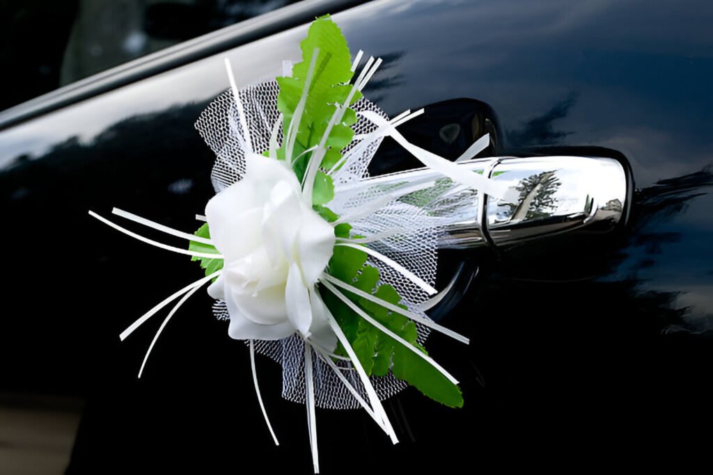 a flower on the handle of a car for wedding