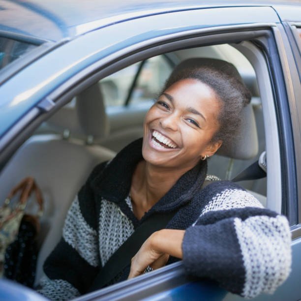 limo sercvice springfield il - a girl smilling in a black car